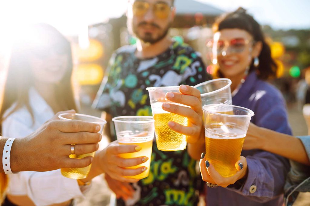 Group of friends drinking beer together